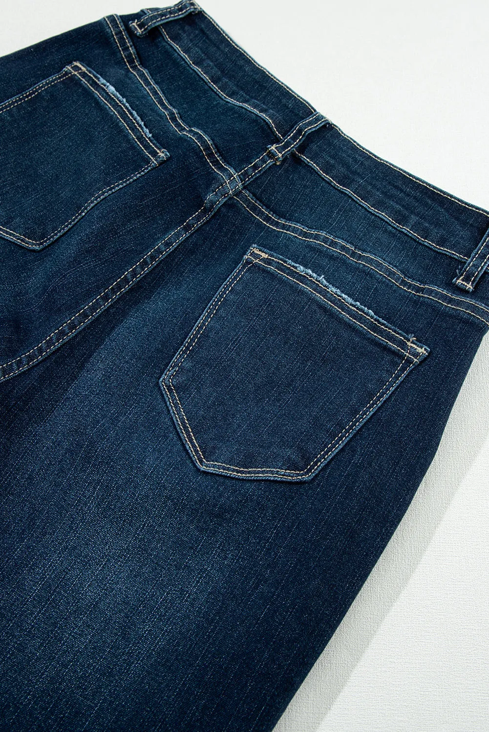 High Rise Ripped Bell Bottom Jeans