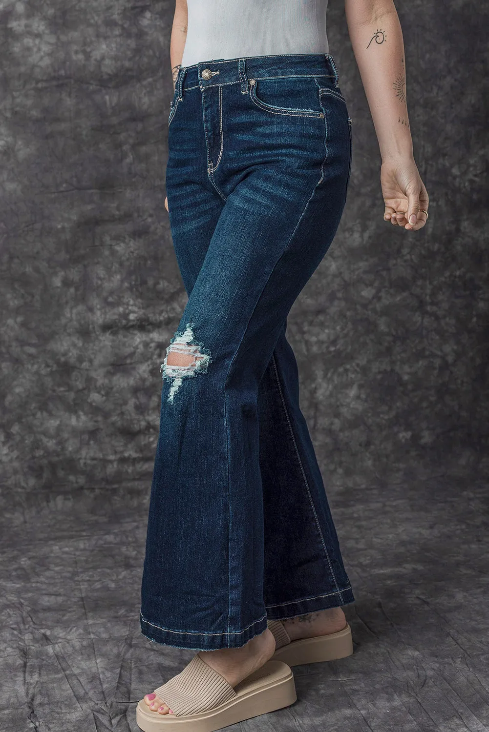 High Rise Ripped Bell Bottom Jeans