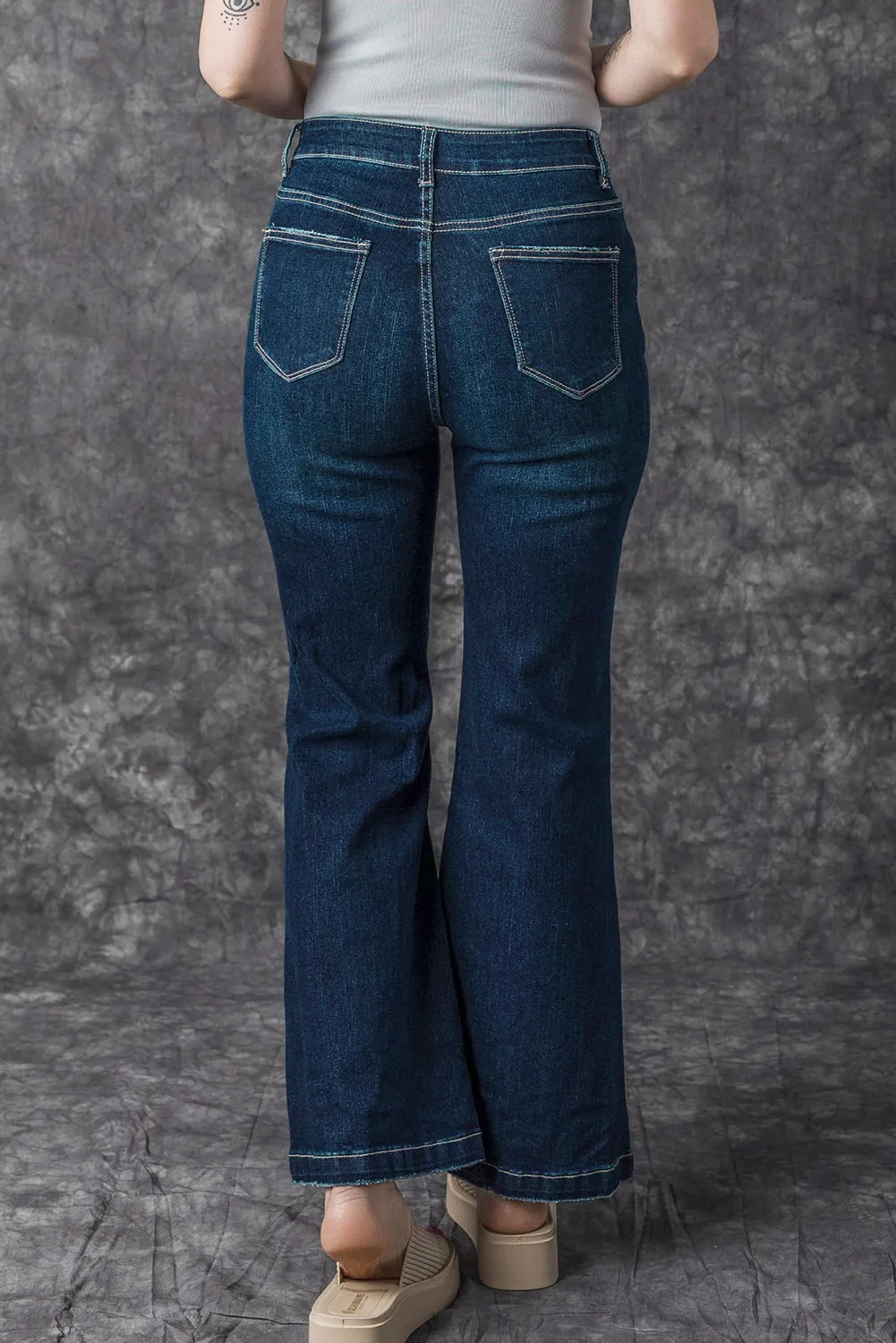 High Rise Ripped Bell Bottom Jeans