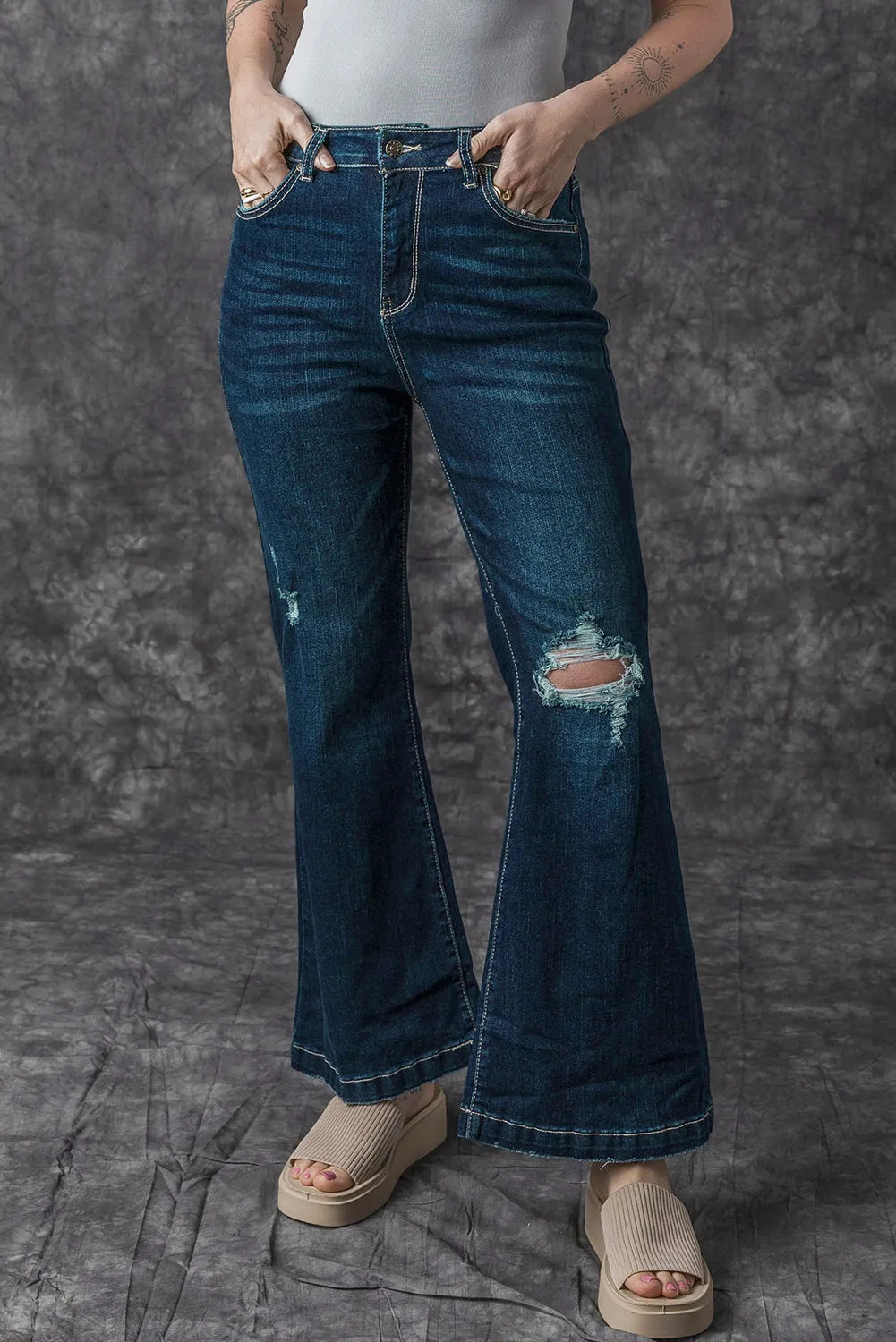High Rise Ripped Bell Bottom Jeans