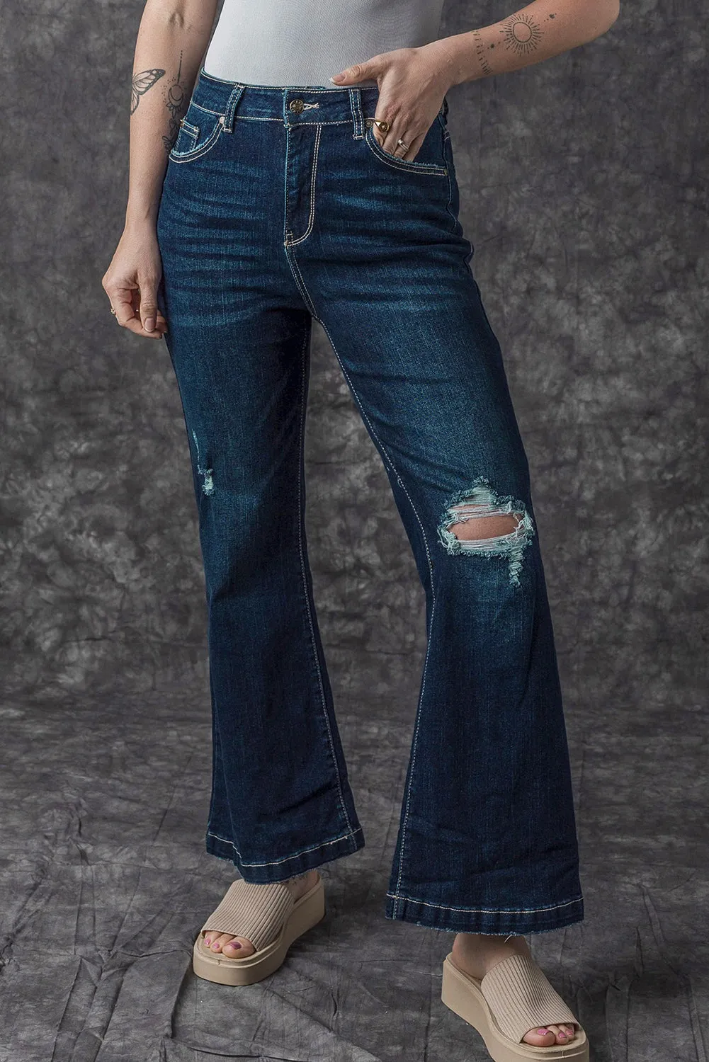 High Rise Ripped Bell Bottom Jeans