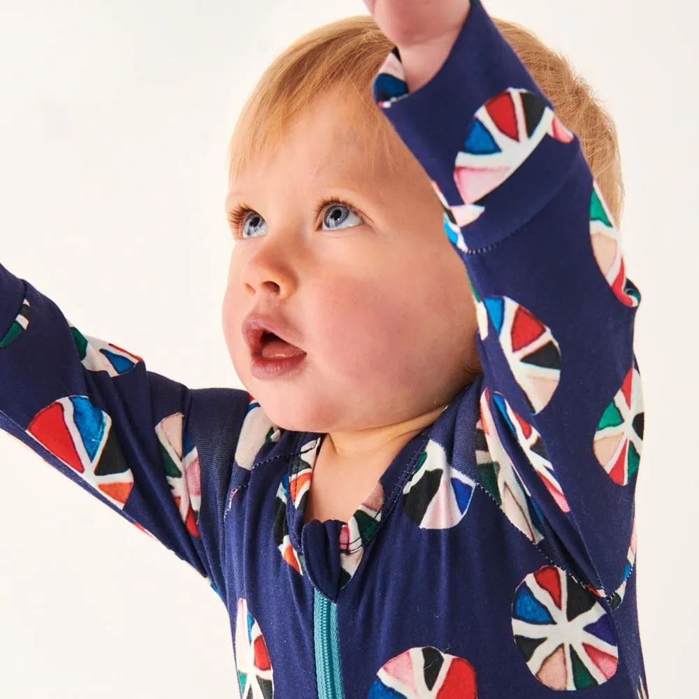 Pin Wheel Navy Organic Zip Romper