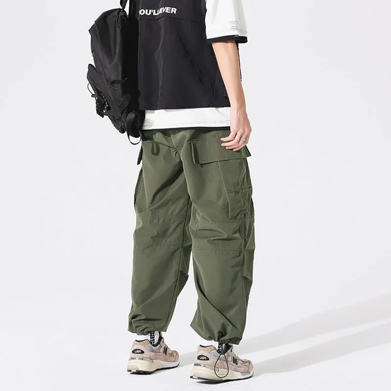 PLEATED KNEES LOOSE STRAIGHT TROUSERS